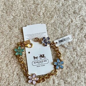 Coach Gold Bracelet with Multicolor Floral Charms